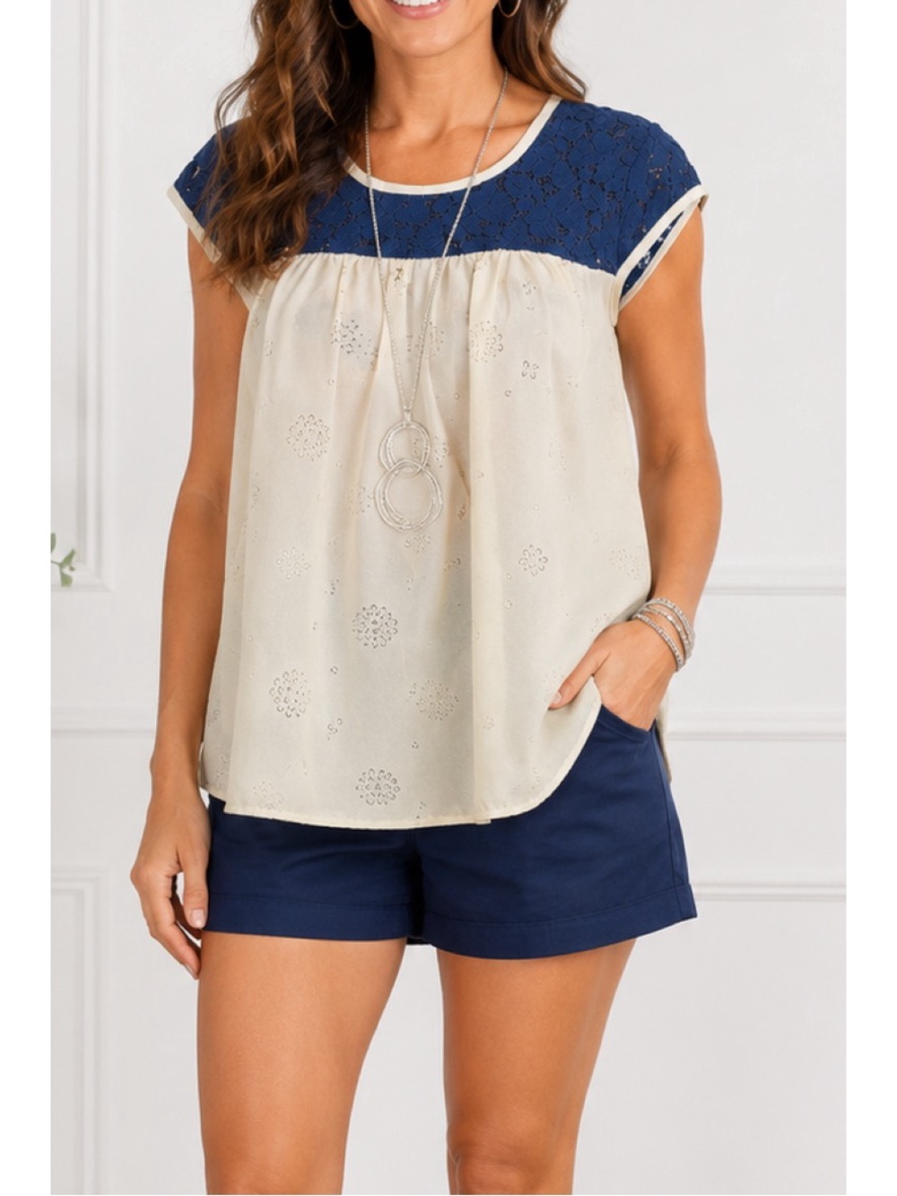 Princess Vera Wang blouse featuring a navy blue lace yoked upper portion